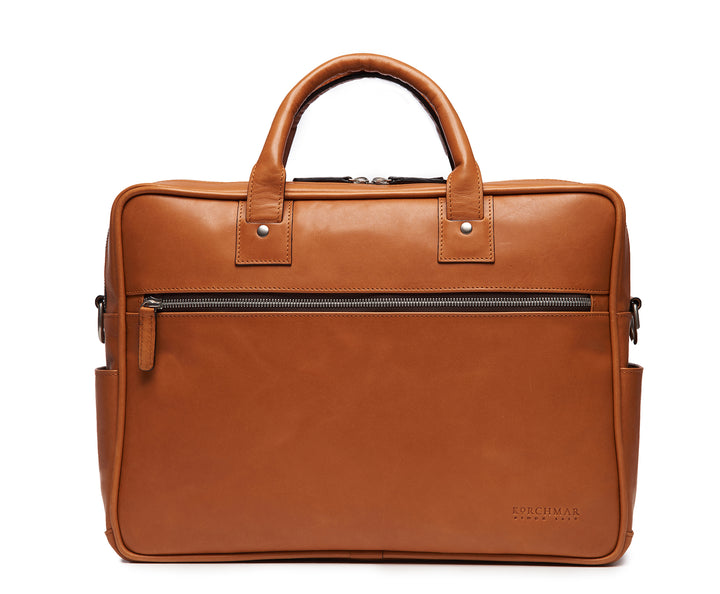 Tan 15" Leather Laptop Briefcase Meticulously designed with full-grain leather, the Redford leather briefcase is a seamless blend of modern functionality and classic style. With two zippered compartments, multiple organizational pockets and a dedicated laptop compartment, the Redford is designed to protect your everyday essentials. #color_tan