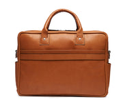 Tan Lightweight construction, handcrafted with American full-grain leather 2 main compartments Multiple organizational pockets, including a cell phone pocket, two additional exterior pockets, and an interior zippered pocket Reinforced roller bag attachment strap that lays flat when not in use Solid brass zipper and hardware with a nickel finish Dimensions: 16" x 4.75" x 12"