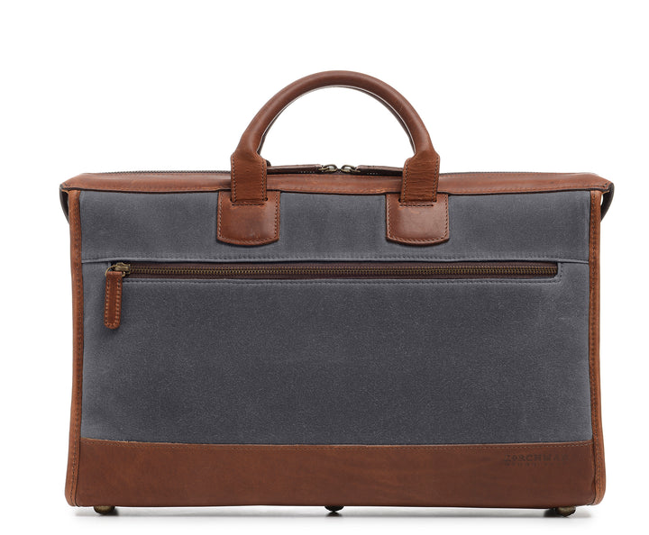 Grey Slim Waxed Canvas Laptop Briefcase The Sawyer's slim, refined silhouette make it perfect for carrying most 15" laptops and small personal items. Carry it by hand or over the shoulder with the included removable, adjustable shoulder strap. The Sawyer is handcrafted with water-resistant waxed canvas and trimmed with full-grain leather. #color_grey