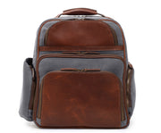 Grey Waxed Canvas and Leather Backpack The Mason is a waxed canvas and leather backpack designed to accommodate a 15" laptop. Featuring numerous organizational pockets, including a water resistant side pocket designed for water bottles, and an interior iPad pocket, the Mason is an ideal solution for work or leisure.