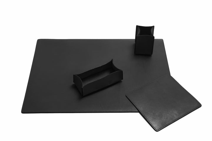 Black Leather desk set Take your work-from-home setup to new heights with our full-grain leather desk set. Featuring our handcrafted desk pad, mouse pad, pencil tray and pencil cup, this handsome set will help keep your workspace refined and organized. #color_black