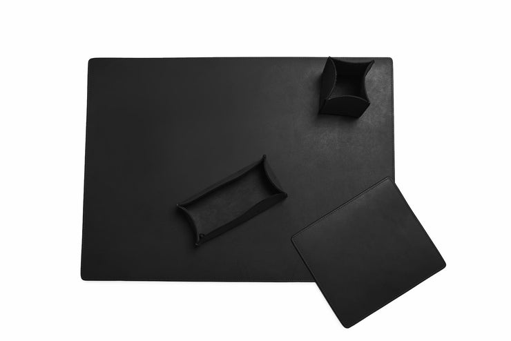 Black Leather desk set Take your work-from-home setup to new heights with our full-grain leather desk set. Featuring our handcrafted desk pad, mouse pad, pencil tray and pencil cup, this handsome set will help keep your workspace refined and organized.