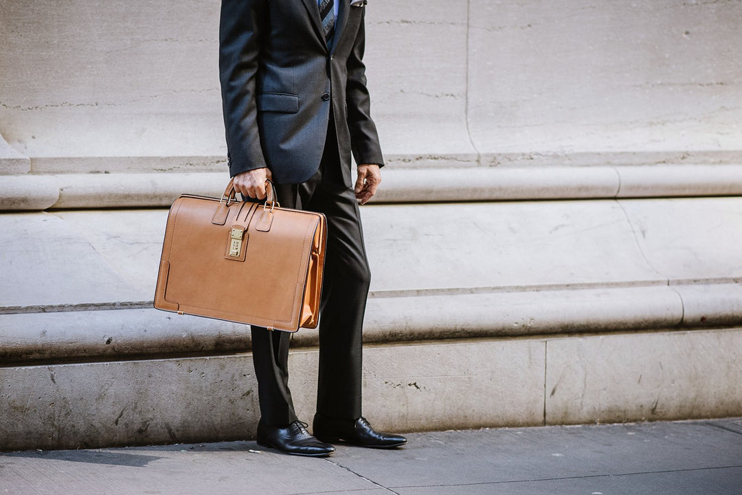 The Churchill is a classic, handcrafted full grain leather briefcase that features a handsome silhouette, and our patented Hinge-Loc technology, which allows the top frame to stay open with ease.