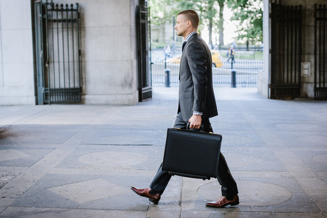 Black The Captain is a top-selling rolling catalog case that features a secure combination locking system, and is designed to accommodate a large volume of files and most 17" laptops.