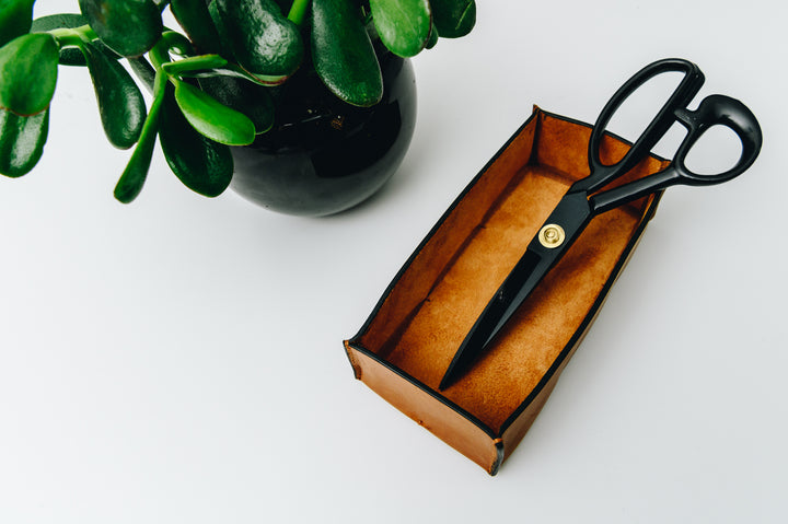 Keep your pencils, pens and other small office essentials organized and easily at reach with the Litton leather pencil tray. The Litton is handcrafted with top-quality full-grain American leather and uses whip-stitches to help form a secure flat base.