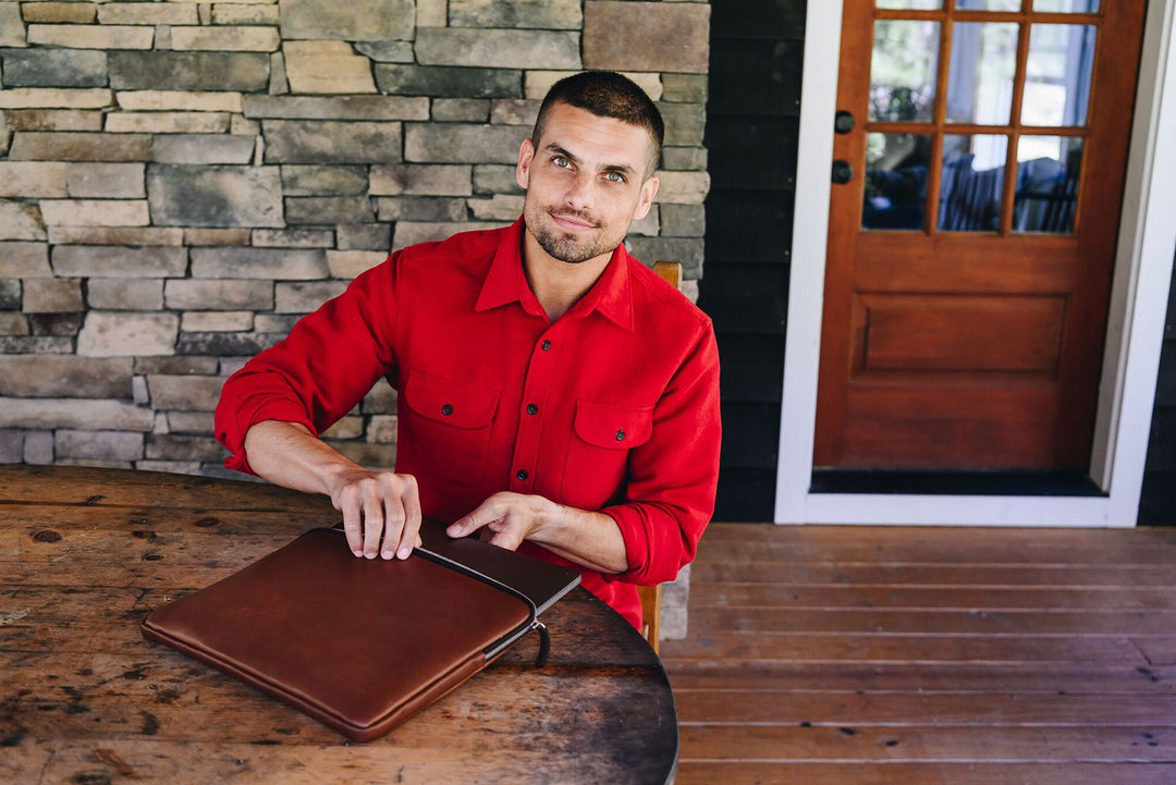 The Clifford laptop sleeve in Korchmar's Classic Leather is made of American cowhide leather that is selected from the top 5% of available hides. Colored only with aniline dyes, this leather retains its natural beauty over time and features visible markings that are characteristic of only the finest leather.