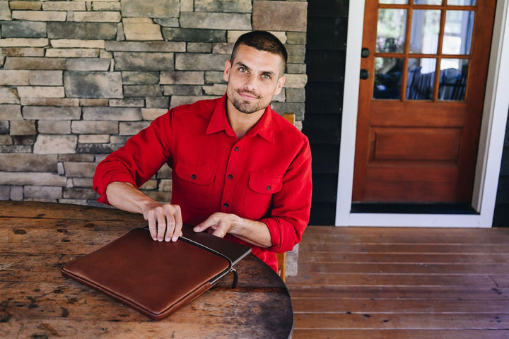 The Clifford laptop sleeve in Korchmar's Classic Leather is made of American cowhide leather that is selected from the top 5% of available hides. Colored only with aniline dyes, this leather retains its natural beauty over time and features visible markings that are characteristic of only the finest leather.