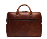 Espresso 15" Leather Laptop Briefcase Meticulously designed with full-grain leather, the Redford leather briefcase is a seamless blend of modern functionality and classic style. With two zippered compartments, multiple organizational pockets and a dedicated laptop compartment, the Redford is designed to protect your everyday essentials. The beautiful tones seen in our signature Espresso leather are created from a unique blend of oils and waxes.