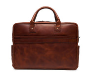 Espresso Lightweight construction, handcrafted with American full-grain leather 2 main compartments Multiple organizational pockets, including a cell phone pocket, two additional exterior pockets, and an interior zippered pocket Reinforced roller bag attachment strap that lays flat when not in use Solid brass zipper and hardware Dimensions: 16" x 4.75" x 12"